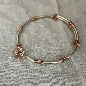 Silver and rose gold bracelet.